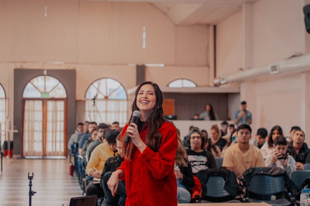 confident speaker on stage